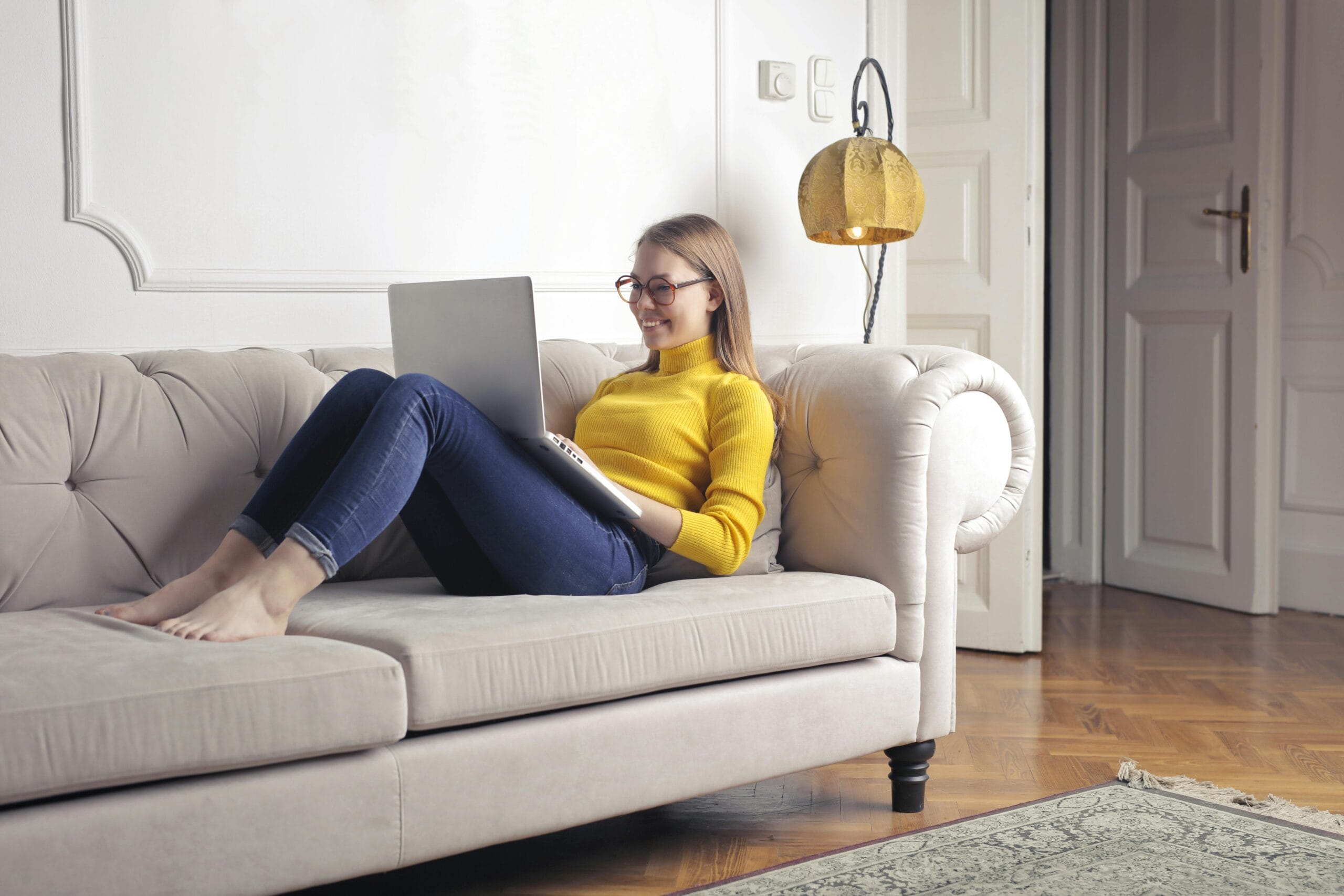 A girl sitting on a luxury sofa