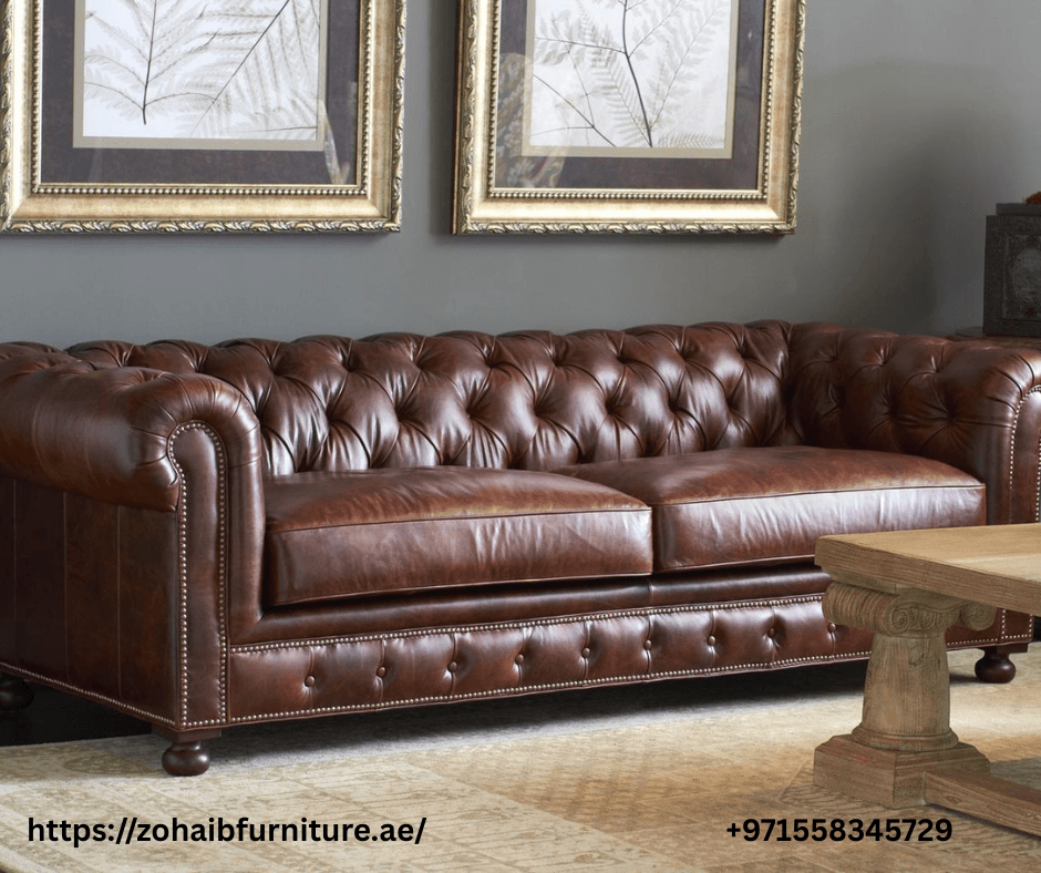 lassic brown leather sofa in a cozy modern living room setup with wooden flooring and accent pillows