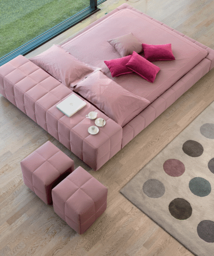 Square patterned bed with side peninsula